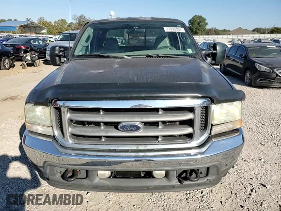 2003 Ford Super Duty F-250 XL with VIN 1FTNW20F73EB02536, listed as a Copart auction lot 77330394 with 170,102 mi miles and Salvage Title. Bid and sale history available at carsss.com. Image 10.