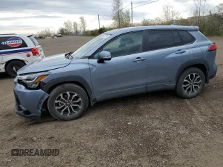 2024 Toyota Corolla Cross Hybrid S z VIN 7MUFBABG1RV028751, wystawiony jako Copart lot #56677915 z przebiegiem 20 255 mil mil oraz Szkoda całkowita • Salvage title. Historia ofert i sprzedaży dostępna na DreamBid. Obrazek 1.