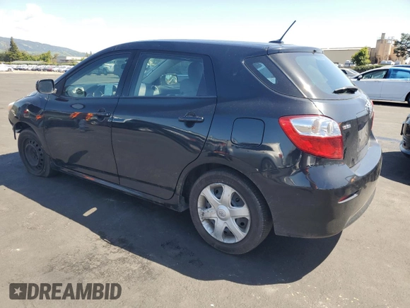 2009 Toyota Matrix with VIN 2T1KU40E89C044203, listed as a Copart auction lot 51802845 with 128,260 mi miles and Salvage Title. Bid and sale history available at carsss.com. Image 2.