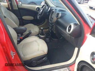 2012 MINI Countryman S with VIN WMWZC5C54CWM13041, listed as a IAAI auction lot 42244303 with 139,733 mi miles and . Bid and sale history available at DreamBid. Image 5.
