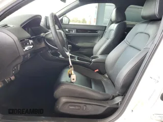 2024 Honda Civic Sport Touring z VIN 19XFL1G85RE012975, wystawiony jako Copart lot #50999015 z przebiegiem 13 552 mil mil oraz Szkoda całkowita • Salvage title. Historia ofert i sprzedaży dostępna na DreamBid. Obrazek 7.