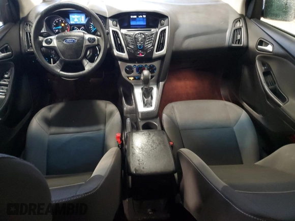 2012 Ford Focus SE z VIN 1FAHP3K24CL407570, wystawiony jako Copart lot #56002135 z przebiegiem 122 730 mil mil oraz Szkoda całkowita • Salvage title. Historia ofert i sprzedaży dostępna na DreamBid. Obrazek 8.
