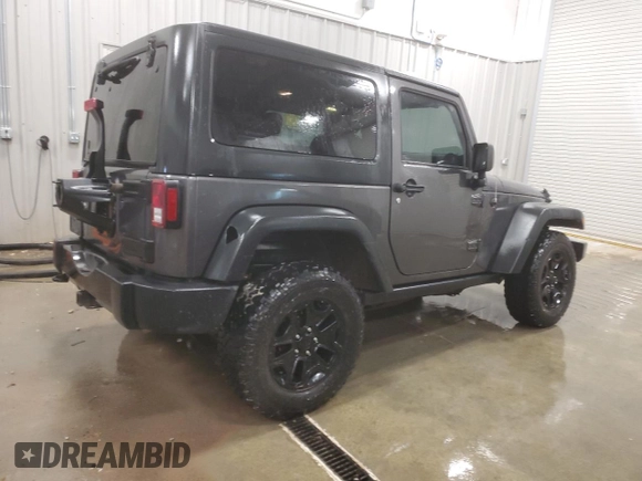 2017 Jeep Wrangler Willys Wheeler with VIN 1C4AJWAG9HL696710, listed as a Copart auction lot 88744905 with 66,800 mi miles and Salvage Title. Bid and sale history available at DreamBid. Image 3.