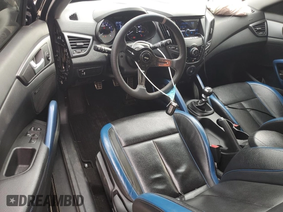 2013 Hyundai Veloster Turbo z VIN KMHTC6AE7DU152689, wystawiony jako Copart lot #51569125 z przebiegiem 102 152 mil mil oraz Szkoda całkowita • Salvage title. Historia ofert i sprzedaży dostępna na DreamBid. Obrazek 8.