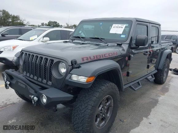2020 Jeep Gladiator Rubicon with VIN 1C6JJTBG8LL135573, listed as a IAAI auction lot 41585896 with 79,070 mi miles. Bid and sale history available at carsss.com. Image 2.