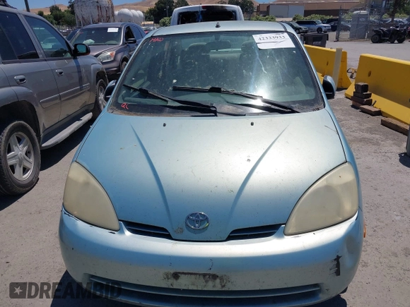 2003 Toyota Prius z VIN JT2BK12U130071262, wystawiony jako IAAI lot #42333933 z przebiegiem 314 553 mil mil oraz . Historia ofert i sprzedaży dostępna na DreamBid. Obrazek 6.