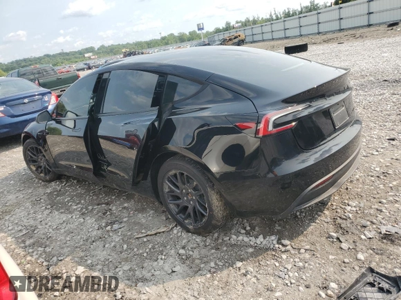2025 Tesla Model 3 Long Range with VIN 5YJ3E1EBXSF939899, listed as a Copart auction lot 58074545 with Not provided miles and Salvage title. Bid and sale history available at DreamBid. Image 2.