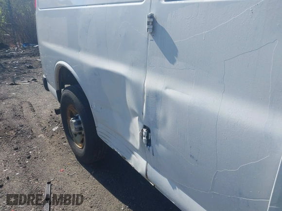 2014 Chevrolet Express Cargo with VIN 1GCWGGCA5E1125676, listed as a IAAI auction lot 42234161 with 285,045 mi miles and . Bid and sale history available at DreamBid. Image 6.