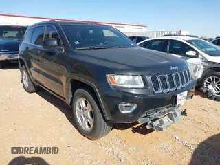 2014 Jeep Grand Cherokee Laredo with VIN 1C4RJEAG1EC348070, listed as a IAAI auction lot 41950898 with 129,883 mi miles. Bid and sale history available at carsss.com. Image 1.
