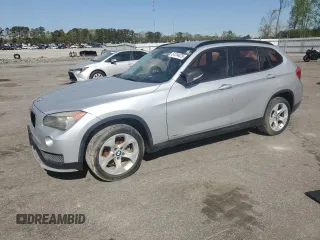 2015 BMW X1 sDrive28i with VIN WBAVM1C59FV498330, listed as a Copart auction lot 51314475 with 157,707 mi miles and Clean Title. Bid and sale history available at carsss.com. Image 1.