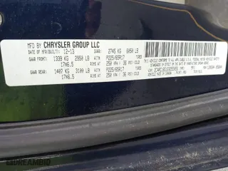 2014 Chrysler Town & Country Touring with VIN 2C4RC1BG1ER255056, listed as a IAAI auction lot 41951379 with 136,606 mi miles. Bid and sale history available at carsss.com. Image 9.