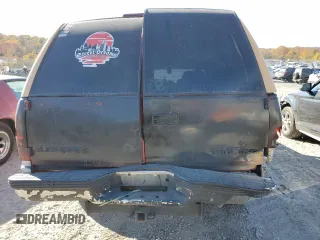 1994 GMC Suburban z VIN 1GKFK16K0RJ751324, wystawiony jako Copart lot #77827404 z przebiegiem 219 786 mil mil oraz Szkoda całkowita • Salvage title. Historia ofert i sprzedaży dostępna na DreamBid. Obrazek 6.