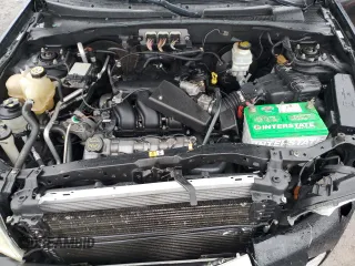 2006 Mercury Mariner Luxury с VIN 4M2CU57146KJ15124, выставлен на аукционе Copart как лот 84397234 с пробегом 232 920 миль миль и Списание • Salvage title. История ставок и продаж доступна на DreamBid. Изображение 12.