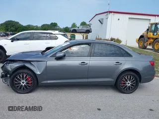 2017 Audi A4 Premium z VIN WAUGNAF42HA025565, wystawiony jako IAAI lot #38943168 z przebiegiem 103 953 mil mil oraz . Historia ofert i sprzedaży dostępna na DreamBid. Obrazek 14.