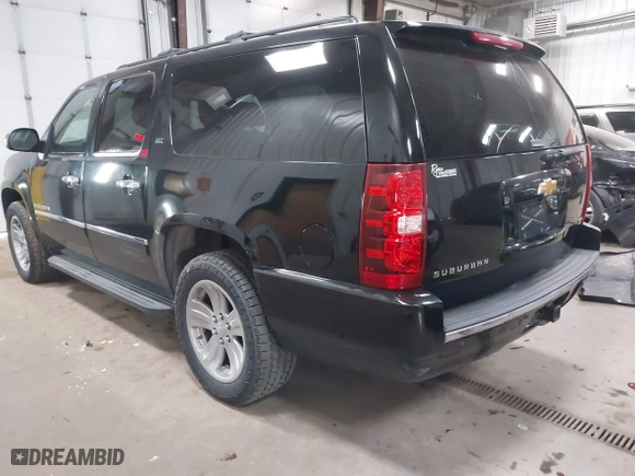 2012 Chevrolet Suburban LTZ with VIN 1GNSKKE77CR326924, listed as a IAAI auction lot 41764487 with 198,224 mi miles. Bid and sale history available at carsss.com. Image 3.