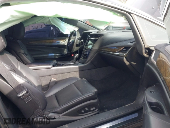 2014 Cadillac ELR z VIN 1G6RR1E41EU601063, wystawiony jako IAAI lot #41637001 z przebiegiem 123 394 mil mil oraz . Historia ofert i sprzedaży dostępna na DreamBid. Obrazek 5.