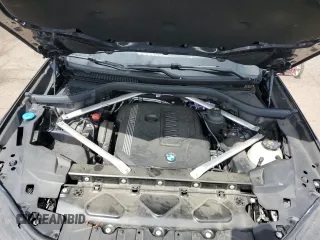 2022 BMW X5 xDrive40i z VIN 5UXCR6C04N9N31737, wystawiony jako Copart lot #57100295 z przebiegiem 26 125 mil mil oraz Szkoda całkowita • Salvage title. Historia ofert i sprzedaży dostępna na DreamBid. Obrazek 11.