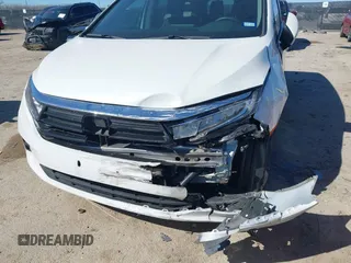 2023 Honda Odyssey Touring with VIN 5FNRL6H88PB003865, listed as a IAAI auction lot 41715384 with 40,765 mi miles and . Bid and sale history available at DreamBid. Image 6.