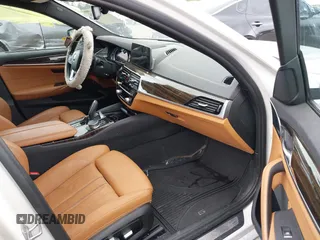 2018 BMW 5 Series 530i xDrive with VIN WBAJA7C5XJWA72470, listed as a IAAI auction lot 42526656 with 66,979 mi miles and . Bid and sale history available at DreamBid. Image 5.