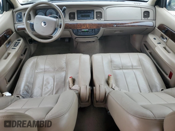 2005 Mercury Grand Marquis LS Premium z VIN 2MEFM75W15X660639, wystawiony jako Copart lot #56580605 z przebiegiem 149 136 mil mil oraz Szkody całkowita. Historia ofert i sprzedaży dostępna na DreamBid. Obrazek 8.