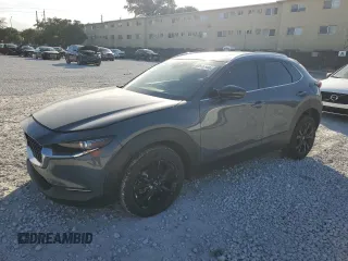 2023 Mazda CX-30 Premium Plus with VIN 3MVDMBEY1PM502358, listed as a Copart auction lot 82976144 with 15,360 mi miles and Salvage title. Bid and sale history available at DreamBid. Image 1.