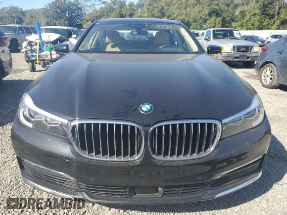 2018 BMW 7 Series 740i with VIN WBA7E2C53JG743115, listed as a Copart auction lot 73362103 with 57,789 mi miles. Bid and sale history available at carsss.com. Image 5.