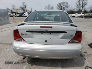 2004 Ford Focus SE with VIN 1FAFP34344W113759, listed as a Copart auction lot 51386335 with 148,267 mi miles and Salvage title. Bid and sale history available at DreamBid. Image 6.