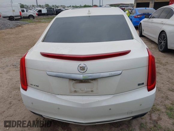 2013 Cadillac XTS Platinum z VIN 2G61U5S3XD9208737, wystawiony jako IAAI lot #41928451 z przebiegiem 167 984 mil mil oraz . Historia ofert i sprzedaży dostępna na DreamBid. Obrazek 16.