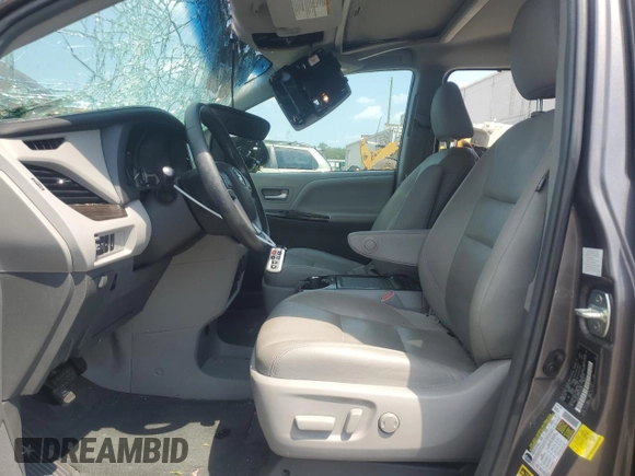 2015 Toyota Sienna XLE with VIN 5TDYK3DC6FS576670, listed as a Copart auction lot 62612345 with 106,475 mi miles and Salvage title. Bid and sale history available at DreamBid. Image 7.