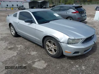 2012 Ford Mustang Premium with VIN 1ZVBP8AMXC5277683, listed as a IAAI auction lot 41674173 with 219,243 mi miles and . Bid and sale history available at carsss.com. Image 1.