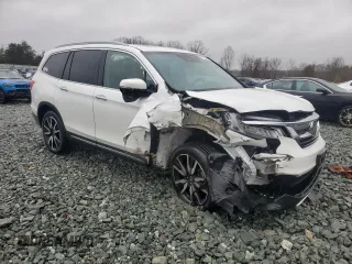 2020 Honda Pilot Touring 8-Passenger with VIN 5FNYF6H95LB053631, listed as a Copart auction lot 47732865 with 67,728 mi miles and Salvage Title. Bid and sale history available at DreamBid. Image 4.