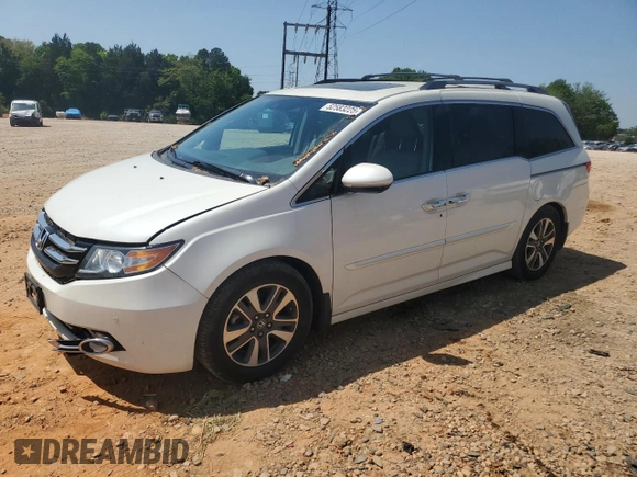 2016 Honda Odyssey Touring Elite with VIN 5FNRL5H94GB109829, listed as a Copart auction lot 52583225 with 70,740 mi miles and Salvage Title. Bid and sale history available at carsss.com. Image 1.