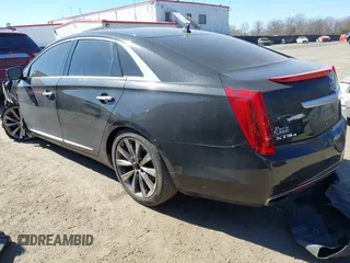 2013 Cadillac XTS Luxury z VIN 2G61R5S33D9184878, wystawiony jako IAAI lot #41644213 z przebiegiem 113 293 mil mil oraz . Historia ofert i sprzedaży dostępna na DreamBid. Obrazek 3.