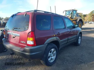 2003 Mazda Tribute ES with VIN 4F2CZ96183KM35719, listed as a IAAI auction lot 40611399 with 136,374 mi miles and . Bid and sale history available at carsss.com. Image 4.
