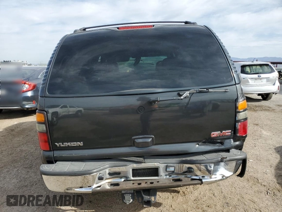 2005 GMC Yukon SLT z VIN 1GKEC13T25R129504, wystawiony jako Copart lot #50785955 z przebiegiem Nie podano mil oraz Szkoda całkowita • Salvage title. Historia ofert i sprzedaży dostępna na DreamBid. Obrazek 6.