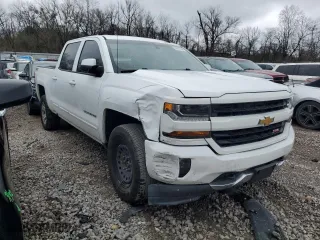 2018 Chevrolet Silverado 1500 LT with VIN 3GCUKREC6JG393695, listed as a Copart auction lot 89266745 with 218,828 mi miles and Clean Title. Bid and sale history available at carsss.com. Image 4.