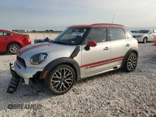 2016 MINI Countryman John Cooper Works with VIN WMWXD1C59GWT97602, listed as a Copart auction lot 52898605 with 141,749 mi miles and Salvage Title. Bid and sale history available at DreamBid. Image 1.