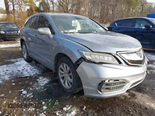 2016 Acura RDX with VIN 5J8TB4H39GL002899, listed as a IAAI auction lot 41384985 with 146,979 mi miles. Bid and sale history available at carsss.com. Image 1.