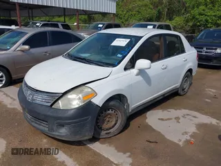 2008 Nissan Versa 1.8 S with VIN 3N1BC11E38L392277, listed as a IAAI auction lot 41927976 with 135,795 mi miles. Bid and sale history available at carsss.com. Image 2.