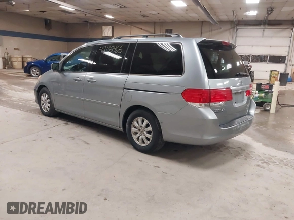 2009 Honda Odyssey EX-L with VIN 5FNRL38789B015524, listed as a IAAI auction lot 42135465 with 242,005 mi miles. Bid and sale history available at carsss.com. Image 3.