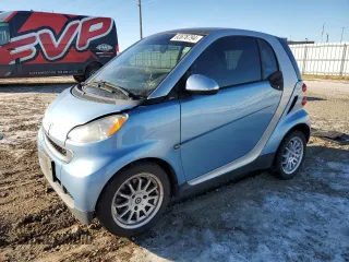 2011 Smart fortwo Pure z VIN WMEEJ3BA2BK425867, wystawiony jako Copart lot #83676794 z przebiegiem 105 883 mil mil oraz Szkoda całkowita • Salvage title. Historia ofert i sprzedaży dostępna na DreamBid. Obrazek 1.
