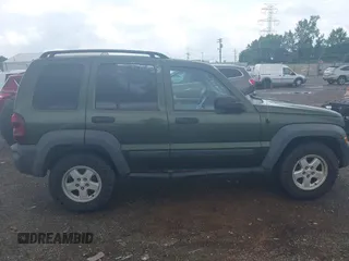 2006 Jeep Liberty Sport with VIN 1J4GL48K76W288408, listed as a IAAI auction lot 39990700 with 215,716 mi miles. Bid and sale history available at carsss.com. Image 13.