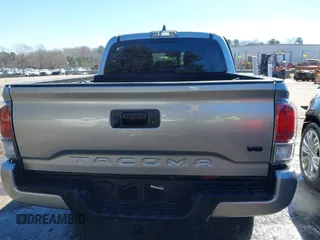 2023 Toyota Tacoma 4WD SR with VIN 3TYCZ5AN7PT122067, listed as a IAAI auction lot 41624047 with 27,483 mi miles. Bid and sale history available at carsss.com. Image 16.