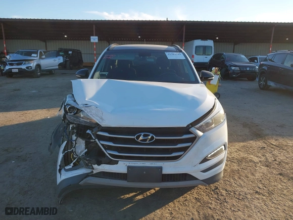2017 Hyundai Tucson Value with VIN KM8J33A27HU541527, listed as a IAAI auction lot 41382244 with 65,848 mi miles. Bid and sale history available at carsss.com. Image 12.