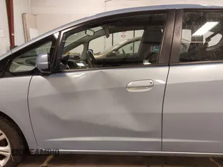 2009 Honda Fit Sport with VIN JHMGE88489S005033, listed as a IAAI auction lot 41861124 with 56,148 mi miles and . Bid and sale history available at DreamBid. Image 16.