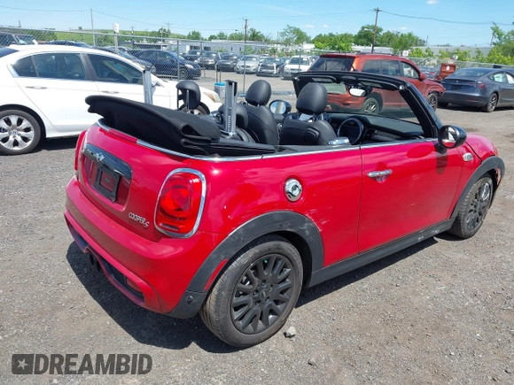 2017 MINI Convertible Cooper S with VIN WMWWG9C53H3C22950, listed as a IAAI auction lot 42297714 with 22,613 mi miles and . Bid and sale history available at DreamBid. Image 4.