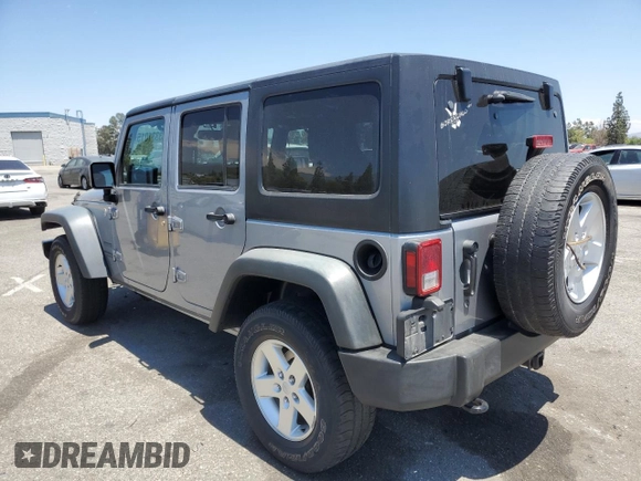2014 Jeep Wrangler Unlimited Sport with VIN 1C4HJWDG1EL221302, listed as a Copart auction lot 63331015 with 213,912 mi miles and Salvage title. Bid and sale history available at DreamBid. Image 2.