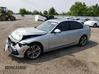2018 BMW 3 Series 330i xDrive with VIN WBA8D9C54JEM34426, listed as a Copart auction lot 60487205 with 158,224 mi miles and Salvage title. Bid and sale history available at DreamBid. Image 1.
