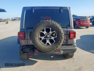 2018 Jeep Wrangler Unlimited Rubicon z VIN 1C4HJXFN3JW236121, wystawiony jako Copart lot #60930565 z przebiegiem 128 727 mil mil oraz Szkoda całkowita • Salvage title. Historia ofert i sprzedaży dostępna na DreamBid. Obrazek 6.