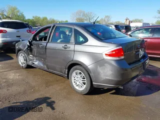 2011 Ford Focus SE with VIN 1FAHP3FN4BW118304, listed as a IAAI auction lot 42031650 with 60,031 mi miles and . Bid and sale history available at DreamBid. Image 3.